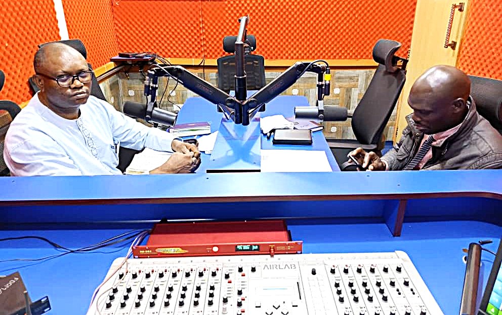 Pst Chris in a radio studio